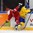 HELSINKI, FINLAND - DECEMBER 30: Sweden's Rasmus Asplund #18 collides with Denmark's Jeppe Korsgaard #20 along the boards during preliminary round action at the 2016 IIHF World Junior Championship. (Photo by Matt Zambonin/HHOF-IIHF Images)

